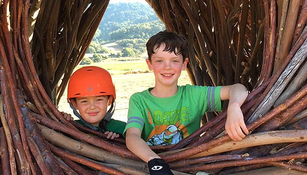 Two boys exploring the Spirit Nest at Stafford Lake Park